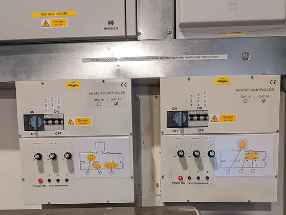 Industrial heater controllers in St Peter's Church, Pavenham