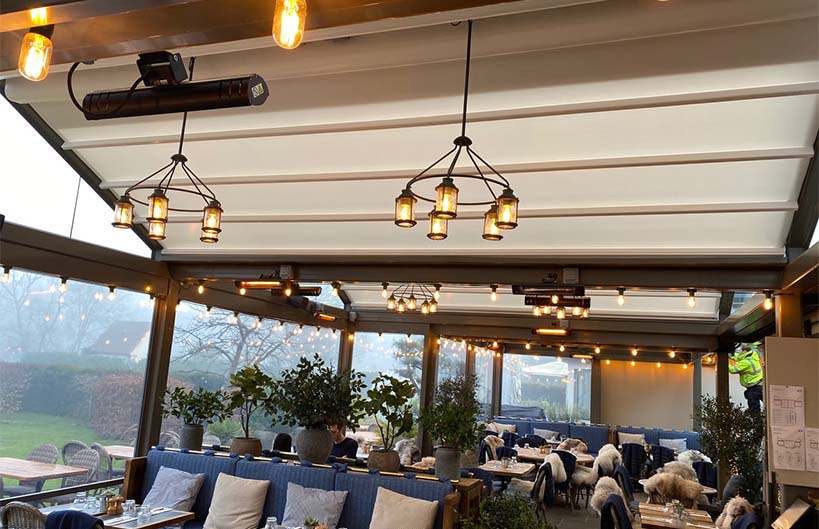Shadow Ultra Low Glare Heaters with remote control in use