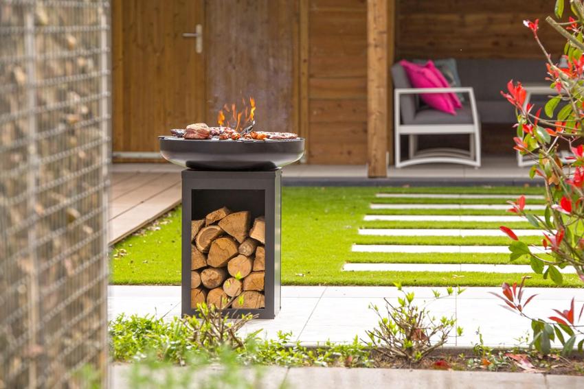 RedFire Matanzas firepit plancha with wood storage