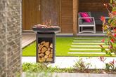 RedFire Matanzas firepit plancha with wood storage